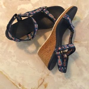 Brand new Sandle.Dark blue, pink and white on straps. Bronze buckles.